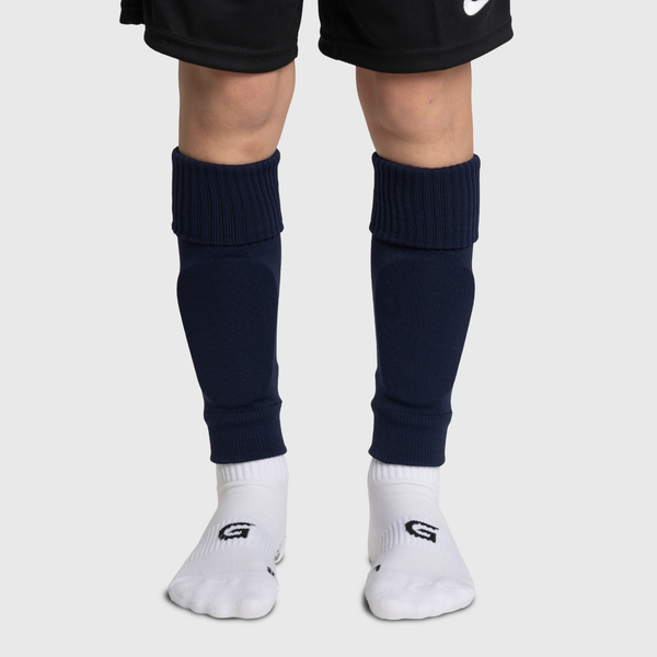 Navy blue football sock sleeve worn with grips socks